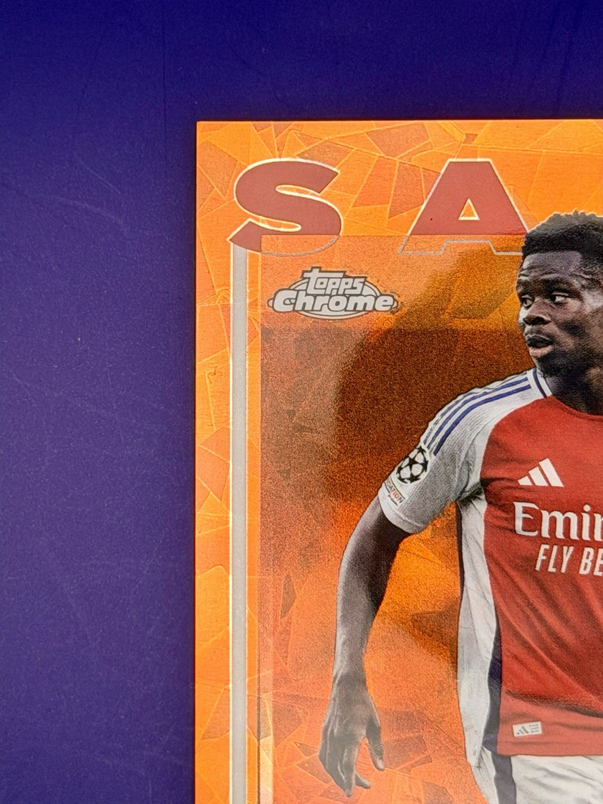 2023-24 Topps Chrome UCC Bukayo Saka Arsenal Orange /25