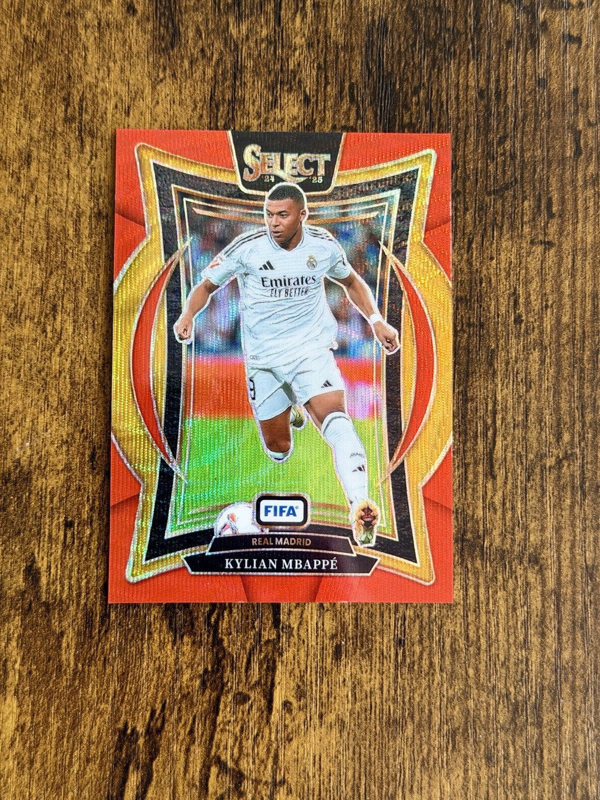 2024-25 Panini Select Fifa - Terrace Kylian Mbappé #1 Red Wave Prizm /59