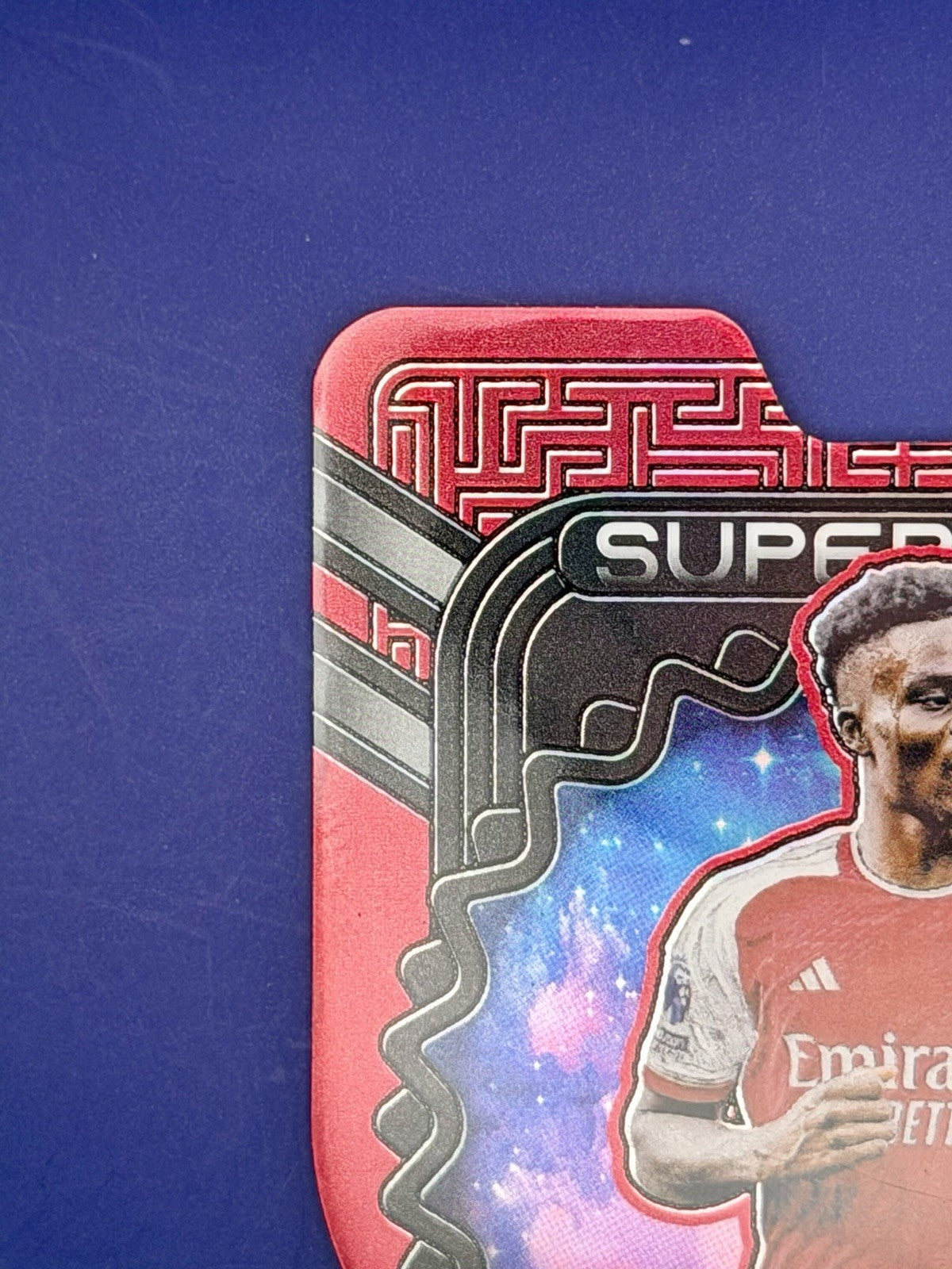 2023-24 Panini Obsidian Bukayo Saka Arsenal Red Supernova Book End 1/10